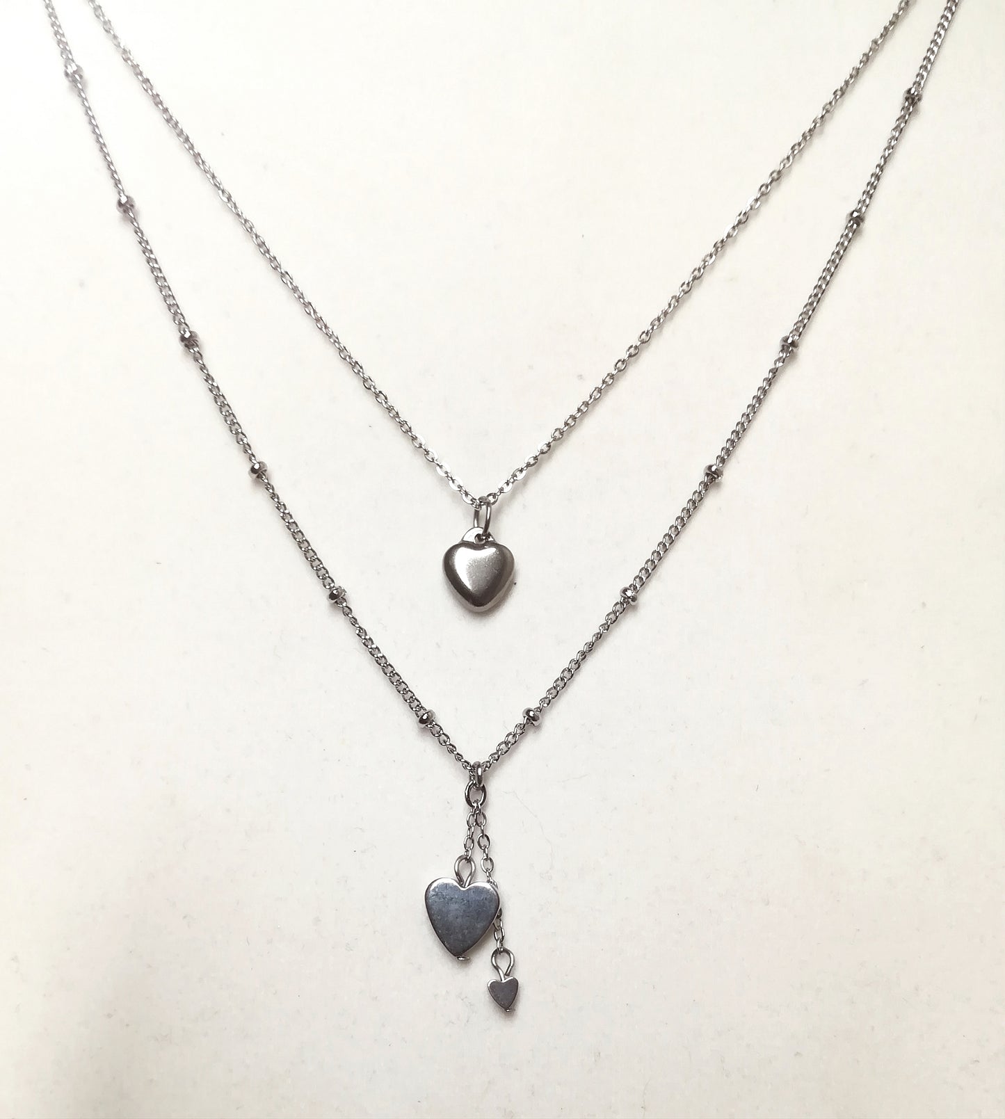 Collier double "petits coeurs"