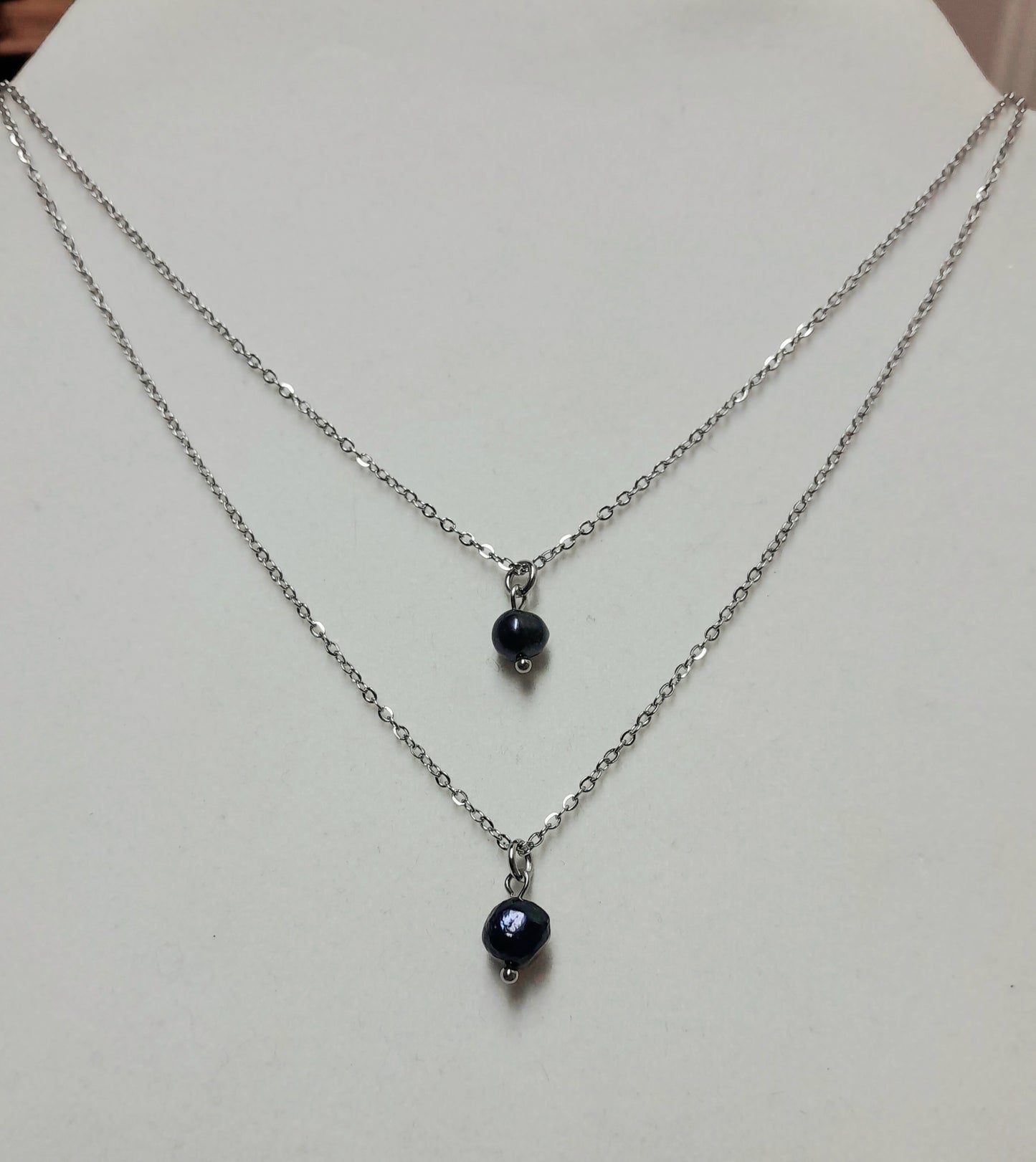 Double perles noires