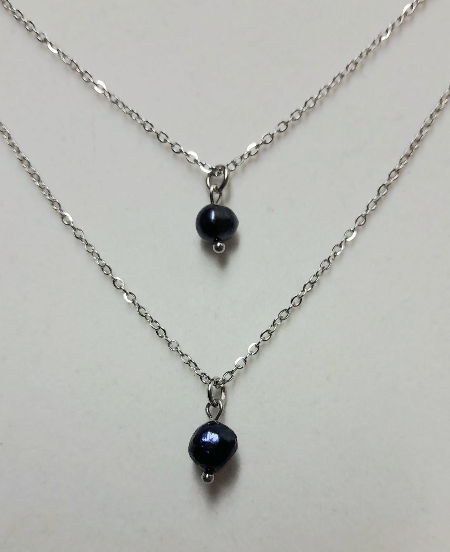 Double perles noires