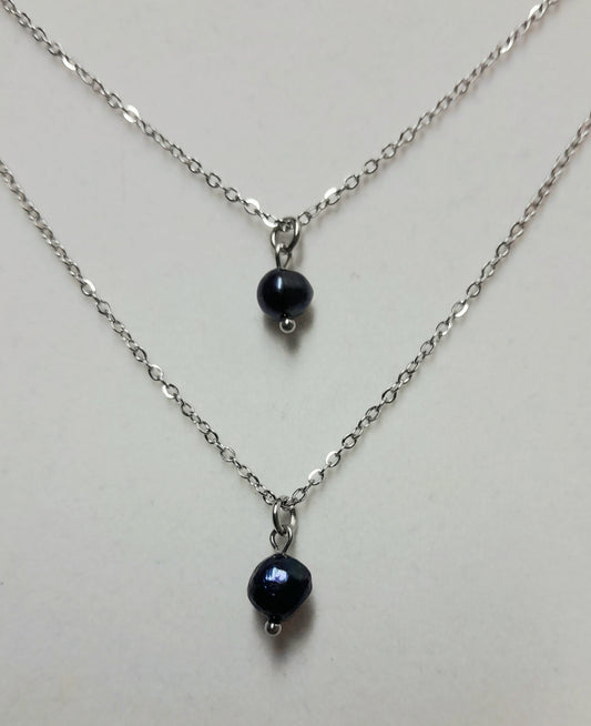 Double perles noires