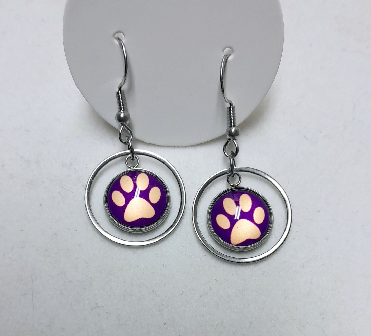 Boucles d'oreilles pattes animaux mauves